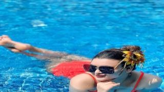 Two cute bi-curious teen girls kiss and cuddle in the pool get caught on film monster&#39;s ball nude